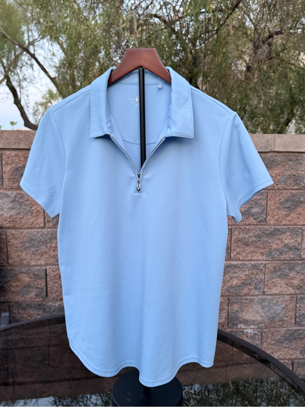 Women’s Sport Haley Courte Short Sleeve Golf Polo 

Color: Atlantic

🚭   🚫 Pets - Picture 3 of 8